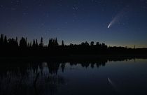 Comet Neowise streaks across the night sky over Wolf Lake in Brimson, Minnesota, USA. July 14, 2020