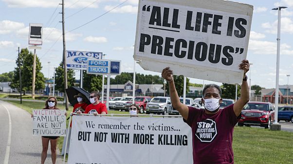 Protesters against the death penalty gather in Terre Haute, Ind., Monday, July 13, 2020 Protesters against the death penalty gather in Terre Haute, Ind., Monday, July 13, 2020