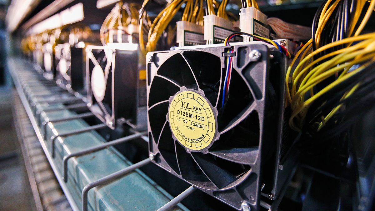 Archive image: Fans used to cool Bitcoin data miners are hooked up on the miners during construction of a Bitcoin data centre in Virginia Beach, Virginia