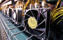 Archive image: Fans used to cool Bitcoin data miners are hooked up on the miners during construction of a Bitcoin data centre in Virginia Beach, Virginia