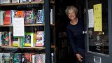 Jane Howe, owner of the Broadway Bookshop, poses for a photo in the doorway of her shop on Broadway Market in Hackney, east London on June 28, 2020