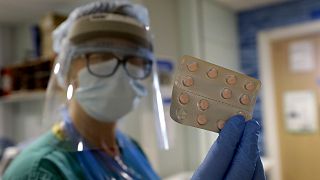 Stella Burns, Lead Clinical Nurse Specialist, prepares medication for a COVID-19 patient at Addenbrooke's hospital in Cambridge, England.