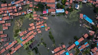 An aerial view shows flooded residential buildings due to rising water levels of the Yangtze river in Jiujiang, China's central Jiangxi province.