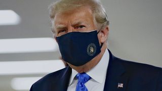 President Donald Trump wears a face mask during a visit to Walter Reed National Military Medical Center in Bethesda on  July 11, 2020.
