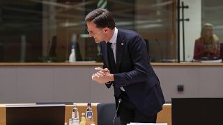 Dutch Prime Minister Mark Rutte smiles during a round table meeting at an EU summit in Brussels