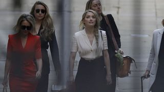 Actress Amber Heard arrives at the High Court, in London, Monday, July 20, 2020. 