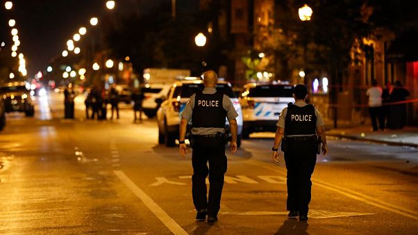 Policías en el lugar del tiroteo de Chicago Policías en el lugar del tiroteo de Chicago