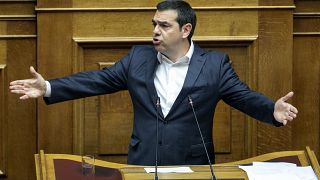 The President of left-wing Syriza party Alexis Tsipras speaks during a parliament session in Athens.