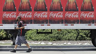 A worker delivers Coca Cola products in Nashville, Tenn