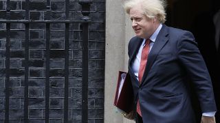 Britain's Prime Minister Boris Johnson leaves 10 Downing Street to attend the weekly session of PMQs in Parliament in London, Wednesday, June 10, 2020.