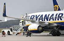 In this Sept. 12, 2018 file photo, a Ryanair plane parks at the airport in Weeze, Germany on Nov. 4, 2019