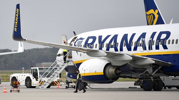 In this Sept. 12, 2018 file photo, a Ryanair plane parks at the airport in Weeze, Germany on Nov. 4, 2019 In this Sept. 12, 2018 file photo, a Ryanair plane parks at the airport in Weeze, Germany on Nov. 4, 2019