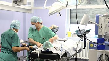 Doctors and nurses prepare an abortion procedure in a hospital in Prenzlau, Germany.