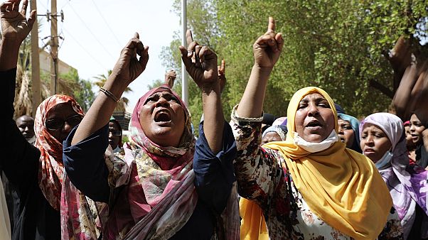 Protesters outside a court in Khartoum where former president Omar al-Bashir is on trial, July 21 2020. Protesters outside a court in Khartoum where former president Omar al-Bashir is on trial, July 21 2020.