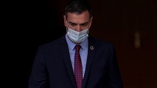 Spanish Prime Minister Pedro Sanchez waits for the arrival of Italy's Prime Minister Giuseppe Conte at the Moncloa palace in Madrid, Spain, Wednesday, July 8, 2020.