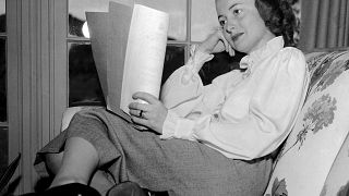 In this April 16, 1948 file photo actress Olivia DeHavilland reads a script.