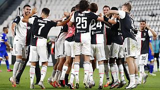 Juventus players celebrate at the end of Serie A soccer match between Juventus and Sampdoria at the Allianz stadium, in Turin.