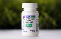 File photo shows a bottle of hydroxychloroquine tablets.