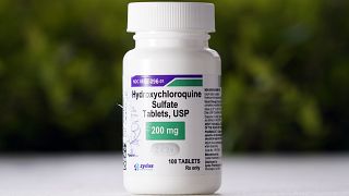 File photo shows a bottle of hydroxychloroquine tablets.