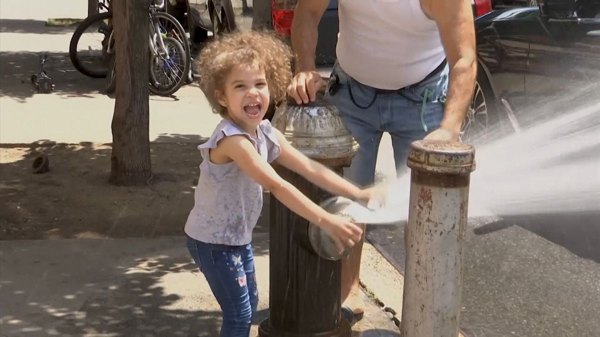 New York City has opened up hundreds of fire hydrants to help locals cope with hot temperatures.