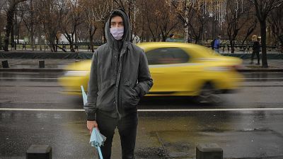 A man wears a mask during an anti-pollution protest outside the city hall in Bucharest, Romania A man wears a mask during an anti-pollution protest outside the city hall in Bucharest, Romania