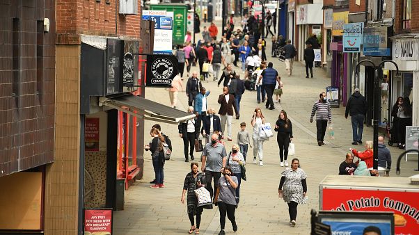 Shoppers in central Rochdale, greater Manchester Shoppers in central Rochdale, greater Manchester