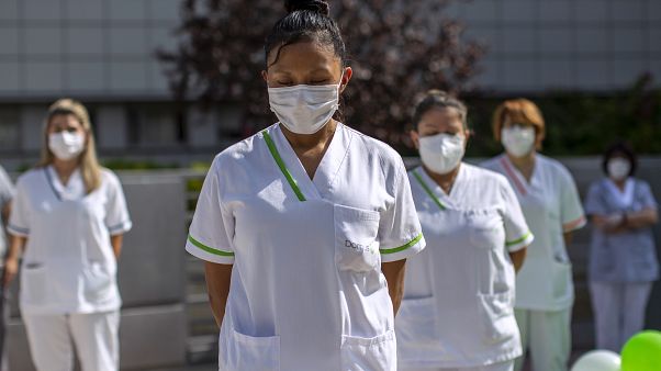 Workers of a nursing home "DomusVi Arturo Soria" hold a minute of silence in support of the social and health sector and its workers in Madrid, Spain Workers of a nursing home "DomusVi Arturo Soria" hold a minute of silence in support of the social and health sector and its workers in Madrid, Spain