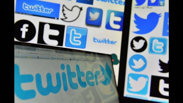 Logos of Twitter displayed on computers' screens Logos of Twitter displayed on computers' screens