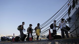 People departing from Piraeus port