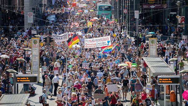 Thousands march along the 'Friedrichstrasse' during the demonstration against coronavirus measures in Berlin Thousands march along the 'Friedrichstrasse' during the demonstration against coronavirus measures in Berlin