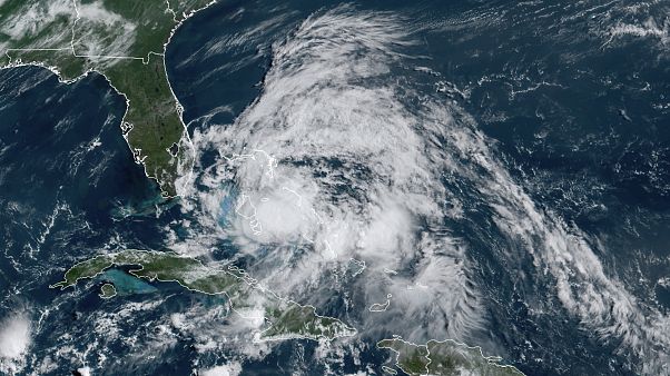The tropical storm blew past the Bahamas on Saturday. The tropical storm blew past the Bahamas on Saturday.