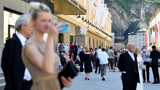 People on Hofstallgasse street prior to the opening performance at the Salzburg Festival