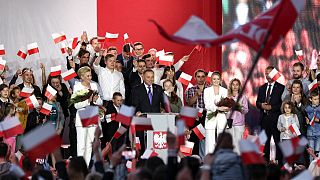 Incumbent President Andrzej Duda addresses supporters in Pultusk, Poland, Sunday, July 12, 2020.