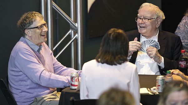Berkshire Hathaway Chairman and CEO Warren Buffett, right, plays bridge with Microsoft co-founder, Bill Gates Berkshire Hathaway Chairman and CEO Warren Buffett, right, plays bridge with Microsoft co-founder, Bill Gates