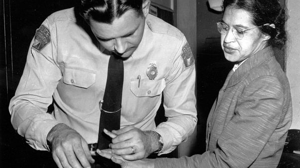 Feb. 22, 1956, file photo: Rosa Parks is fingerprinted by police Lt. D.H. Lackey in Montgomery, Ala., Feb. 22, 1956, file photo: Rosa Parks is fingerprinted by police Lt. D.H. Lackey in Montgomery, Ala.,
