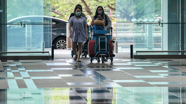 Singapur'a seyahat edenlere karantinada elektronik kelepçe - Covid-19 salgını Singapur'a seyahat edenlere karantinada elektronik kelepçe - Covid-19 salgını