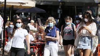 Tourists wearing masks visit Saint Malo, Brittany,