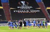 Getafe's team stands on the pitch during the training session prior the Europa League