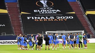 Getafe's team stands on the pitch during the training session prior the Europa League