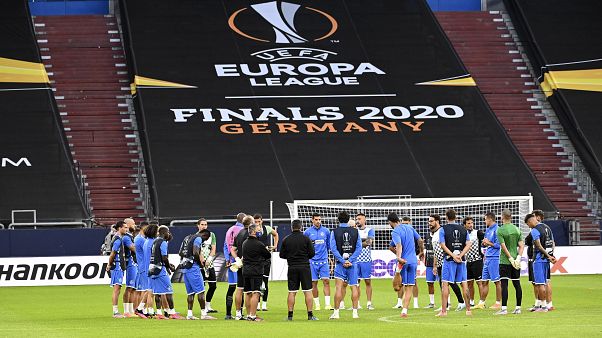 Getafe's team stands on the pitch during the training session prior the Europa League Getafe's team stands on the pitch during the training session prior the Europa League
