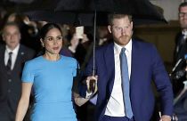 FILE - Prince Harry and Meghan, the Duke and Duchess of Sussex arrive at the annual Endeavour Fund Awards in London on March 5, 2020. 