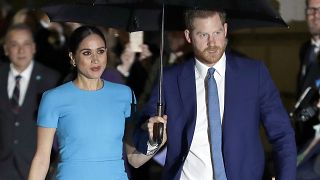 FILE - Prince Harry and Meghan, the Duke and Duchess of Sussex arrive at the annual Endeavour Fund Awards in London on March 5, 2020.