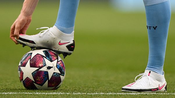 A player warms up before a Champions League match.