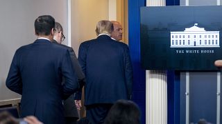 President Donald Trump is asked to leave thePress Briefing Room by a member of the U.S. Secret Service during a news conference at the White House, Monday, Aug. 10, 2020