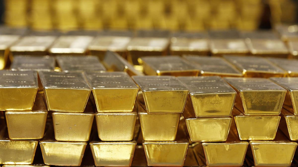 Gold bars are stacked in a vault at the United States Mint, in West Point, N.Y