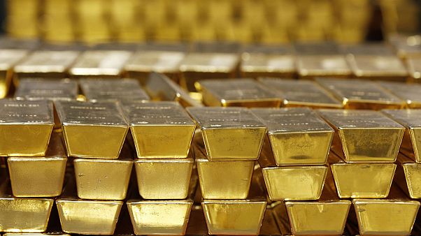 Gold bars are stacked in a vault at the United States Mint, in West Point, N.Y Gold bars are stacked in a vault at the United States Mint, in West Point, N.Y