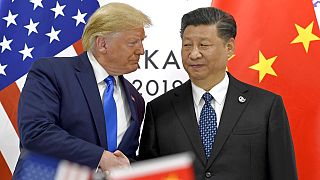 ABD Devlet Başkanı Donald Trump (solda), Çin Devlet Başkanı Şi Jingpin (sağda)