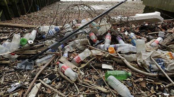 2018 file photo, plastic bottles and other plastics including a mop, lie washed up on the north bank of the River Thames in London. 2018 file photo, plastic bottles and other plastics including a mop, lie washed up on the north bank of the River Thames in London.