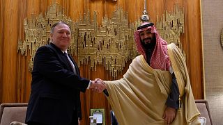 Mike Pompeo,shakes hands with bin Salman