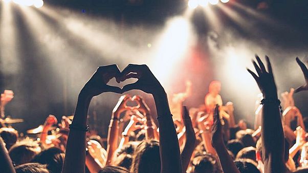 A crowd attends a music concert before the coronavirus pandemic hit Europe A crowd attends a music concert before the coronavirus pandemic hit Europe